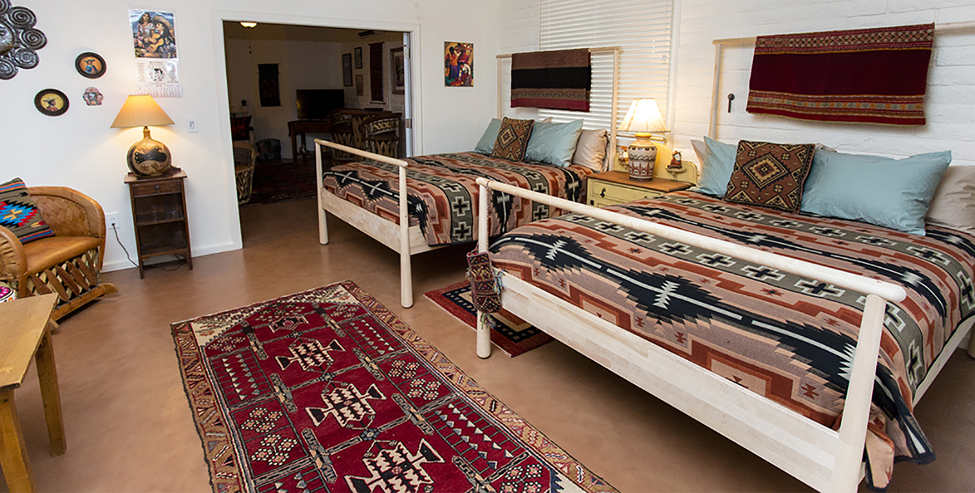 Beds in Oaxaca Suite at Cat Mountain Roadside Inn