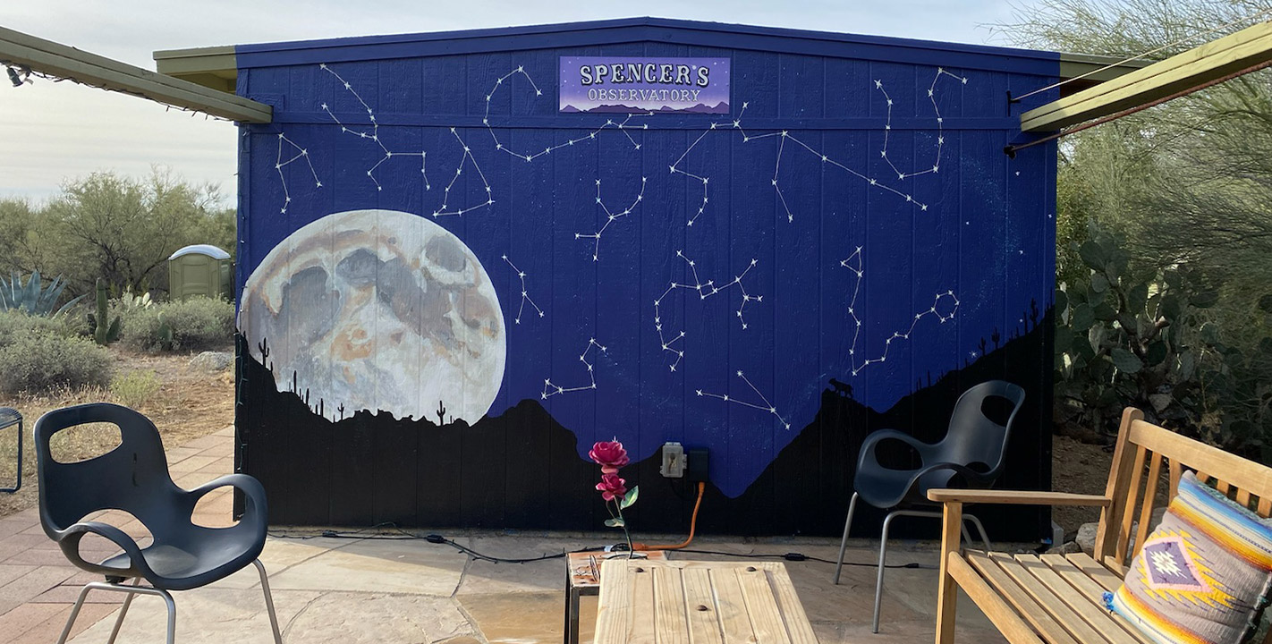 Spencer's Observatory mural and outdoor sitting area