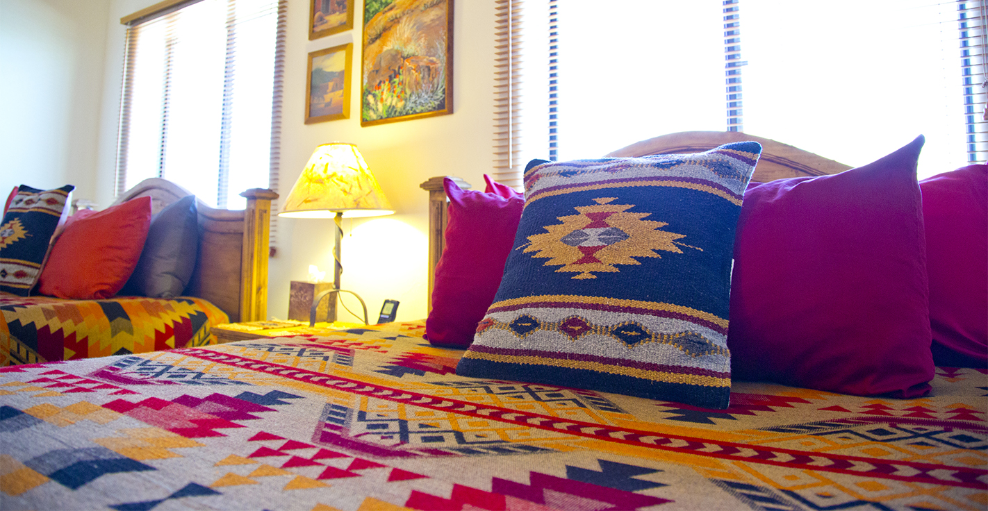 Bedding in Sierra Madre Room in Cat Mountain Lodge