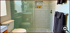 The Strawbale Studio bathroom with walk-in shower at Cat Mountain Lodge